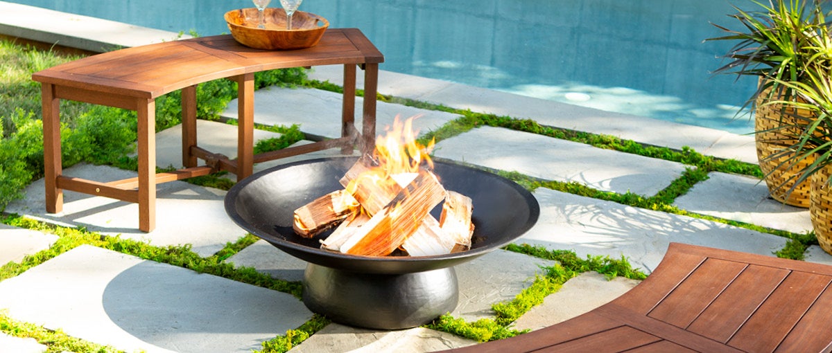 Image of Zen Metal Fire Pit and curved wood benches - shop outdoor furniture.