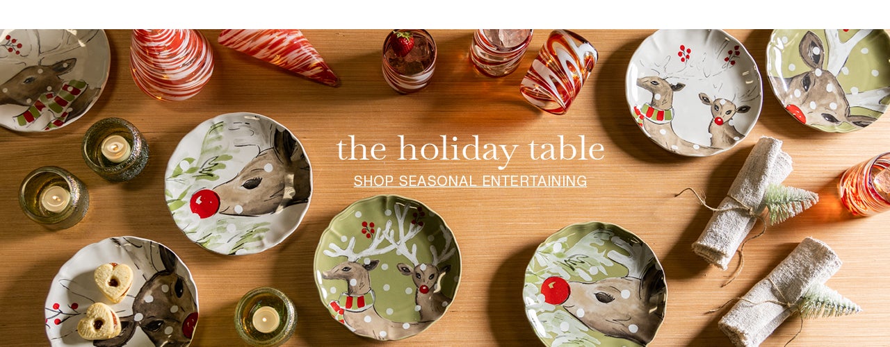 A table is set with Deer Portrait Dessert Plates, Holiday Swirl Pints & Tumblers. the holiday table. SHOP SEASONAL ENTERTAINING.