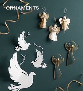Image of paper dove and abaca angel ornaments. Shop Trees + Ornaments.