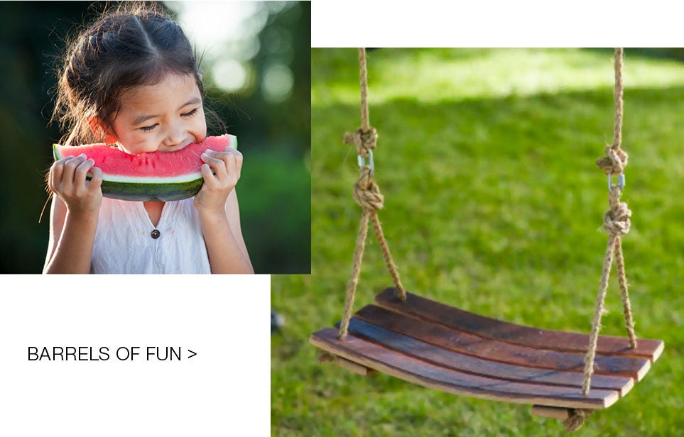 barrel stave swing and child eating watermelon slice for barrels of fun