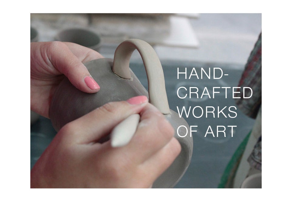 artisan texturing clay mug Hand-crafted works of art